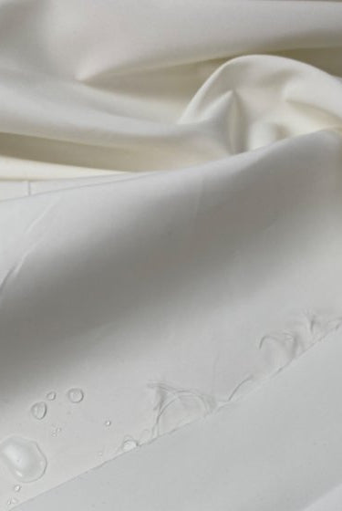 Luis Vuitton raincoat fabric - Shades of white